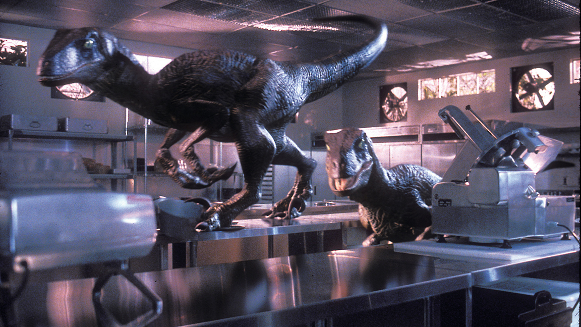 Best CGI movies of the 90s; dinosaurs on a kitchen work surface