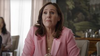 Molly Shannon wearing pink blazer in Only Murders in the Building
