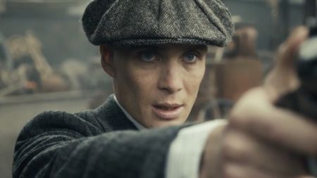 Cillian Murphy holding a gun in Peaky Blinders season 6