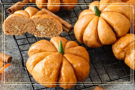 A cake in the shape of a pumpkin