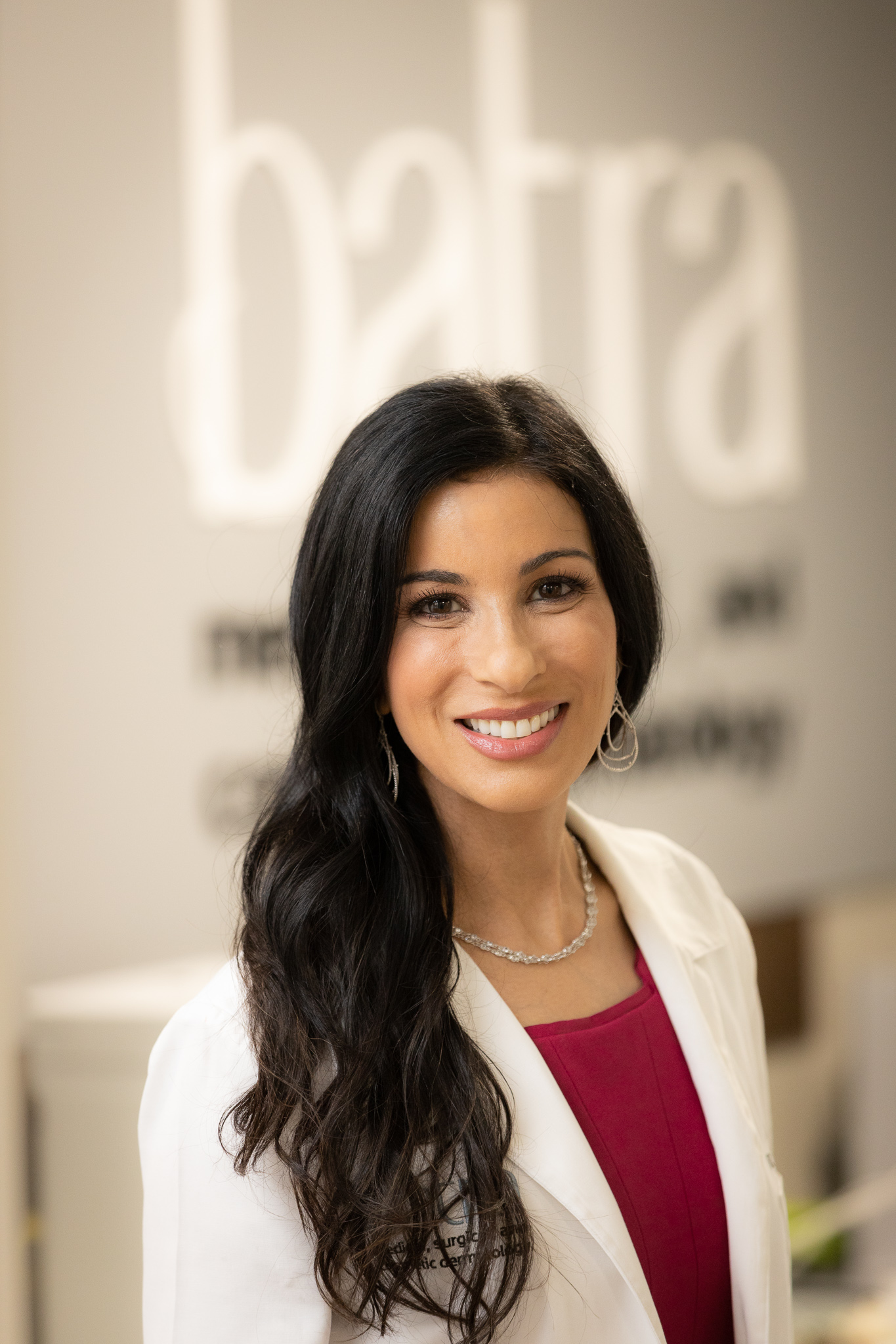 Dr. Sonia Batra in a white coat