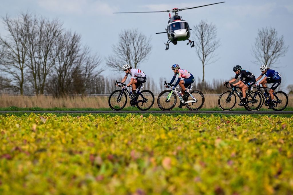 FenixDeceunincks Austrian rider Christina Schweinberger L CanyonSRAMs Belgian rider Shari Bossuyt Team DSMs US rider Megan Jastrab and FenixDeceunincks Belgian rider Julie De Wilde cycle during the womens elite race of the Classic BruggeDe Panne oneday cycling race 1595 km from Brugge to De Panne on March 23 2023 with a helicopter in the background Photo by DIRK WAEM Belga AFP Belgium OUT Photo by DIRK WAEMBelgaAFP via Getty Images