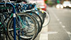 bikes locked up next to a road