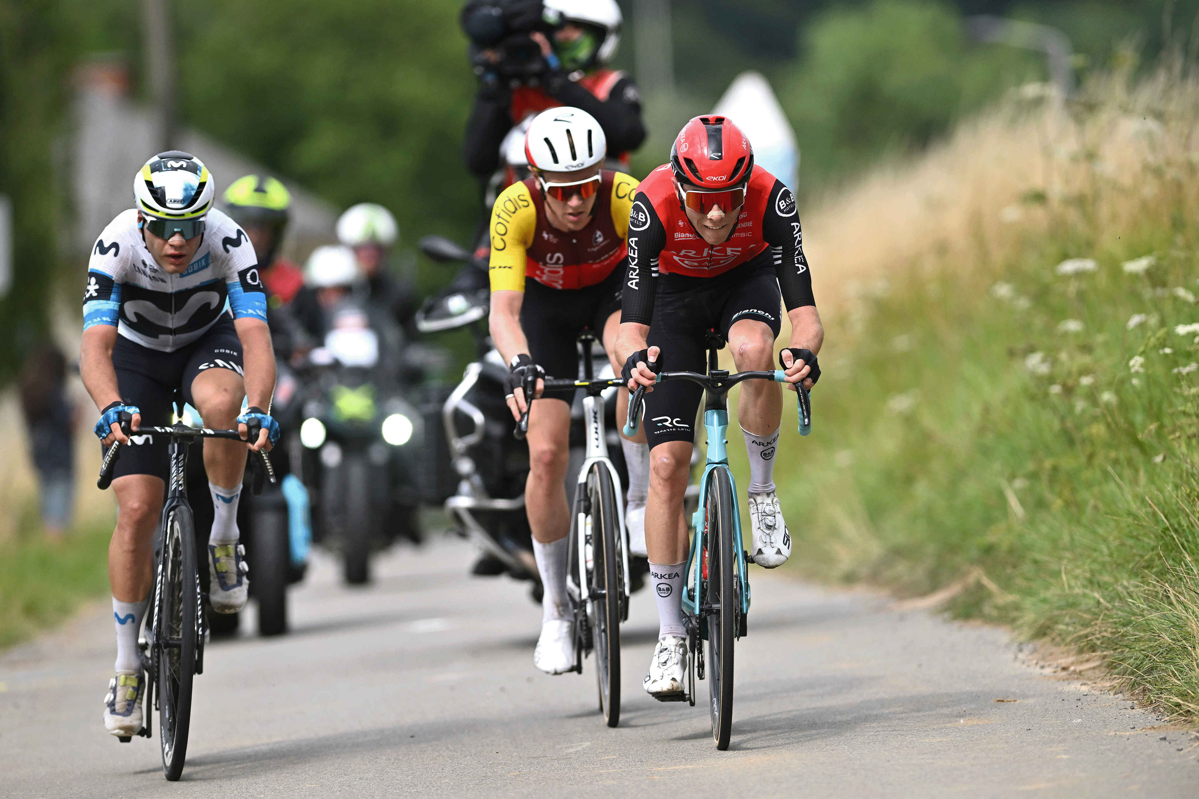 SAMBREVILLE, BELGIUM - JULY 27: (L-R) Lorenzo Milesi of Italy and Team Movistar, Oliver Knight of Great Britain and Team Cofidis and Louis Rouland of France and Team Arkea - B&B Hotels compete in the breakaway during the 46th Tour de Wallonie2025, Stage 2 a 153.1km stage from Huy to Sambreville on July 27, 2025 in Sambreville, Belgium. (Photo by Luc Claessen/Getty Images)