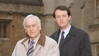 John Thaw in a light jacket and Kevin Whately in a dark jacket as Morse and Lewis in Inspector Morse.