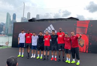 Manchester United’s Aaron Wan-Bissaka, Paul Pogba and Juan Mata on stage during the Adidas event in Singapore