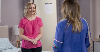 Sindi Watts makes a surprise visit to Dee Bliss's hotel room in Neighbours.