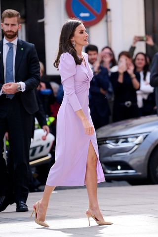 Queen Letizia wearing a light pink long sleeve midi dress