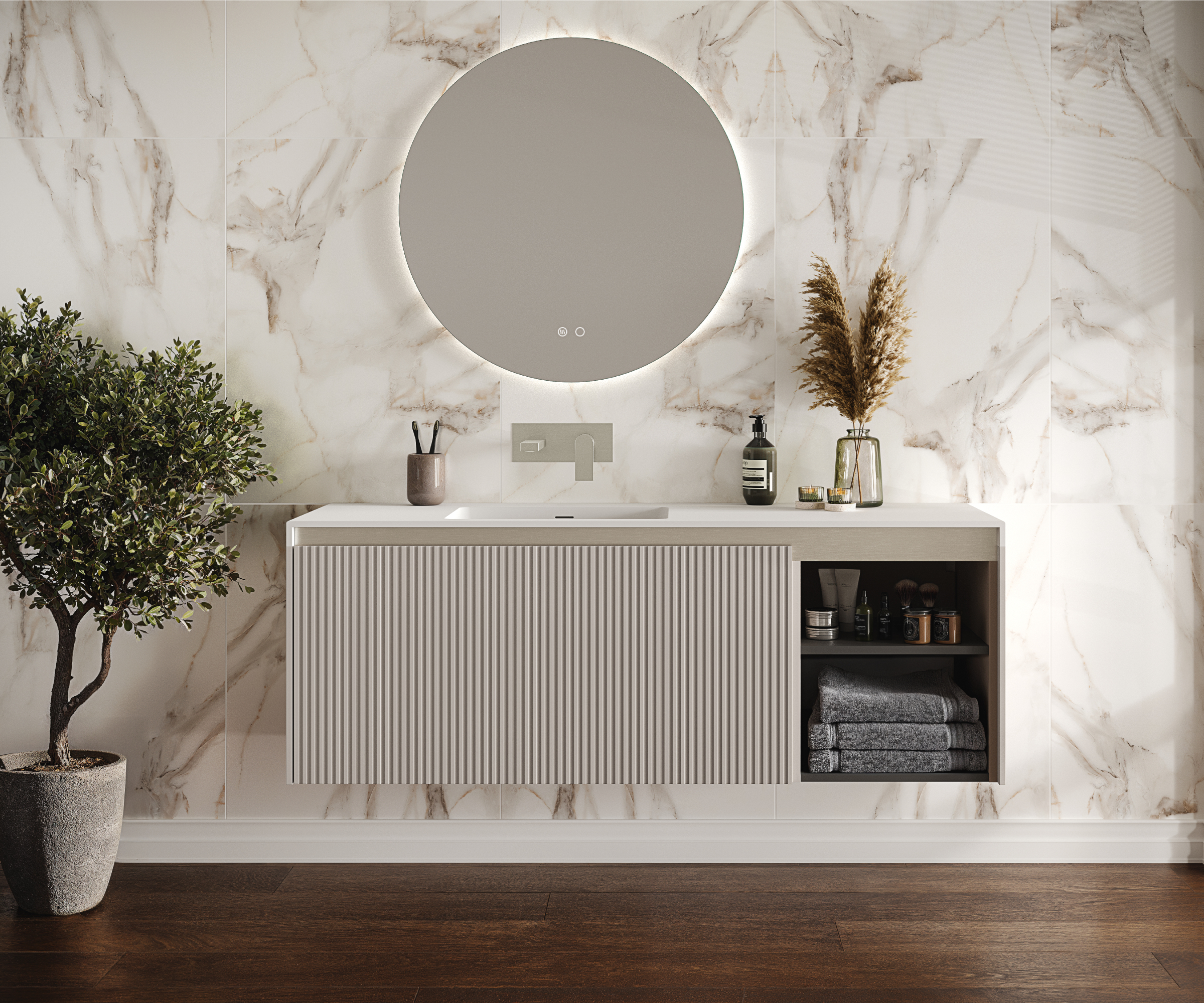 wall mounted bathroom vanity unit with partially closed ribbed front but open section shelving to one side against marble clad wall, dark wooden floor and with bathroom light with mirror above