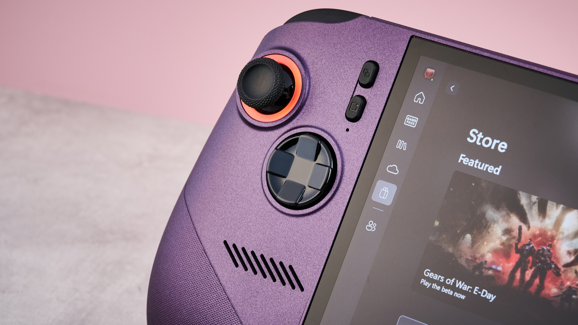 A closeup of the MSI Claw 8 EX AI+, showing its left thumbstick, D-pad, View button and Quick Setting button.
