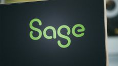 Sage logo and branding pictured on a laptop screen in green lettering.