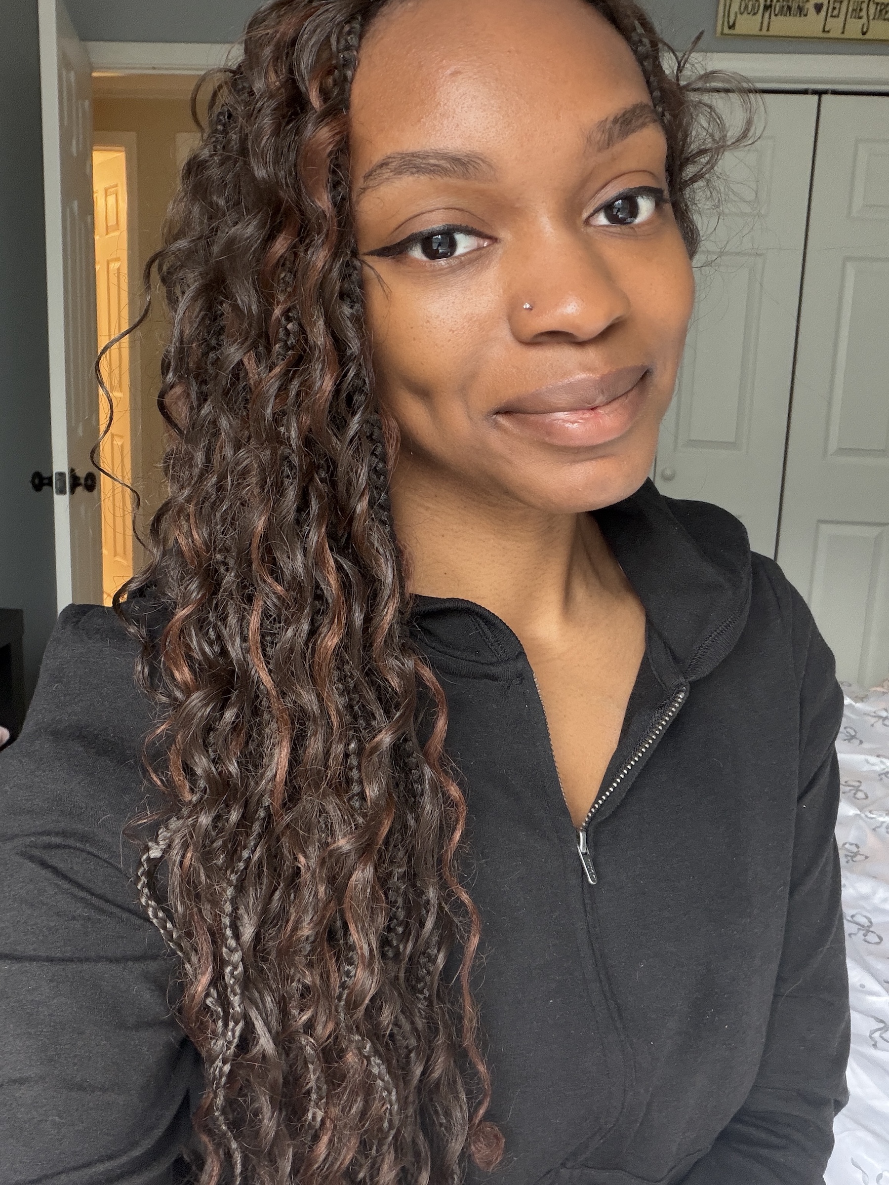 an after image of a woman testing a black liquid eyeliner