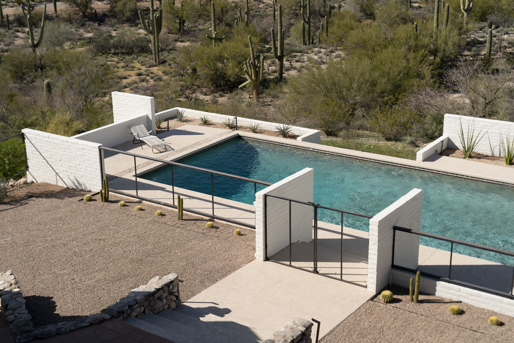 view of Ramada House by Judith Chafee, white, simple modernist house in the american desert