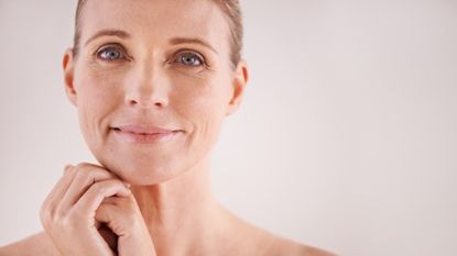 lady with smooth skin has learned how to prevent wrinkles