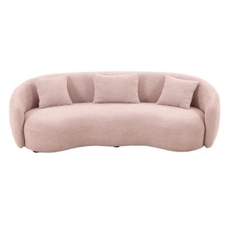 A pink rounded sofa
