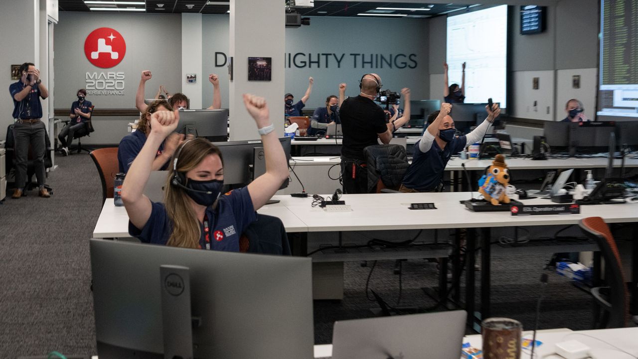 Inside a mission support area at NASA's Jet Propulsion Laboratory in Southern California, Mars 2020 Perseverance team members displayed their joy as the spacecraft successfully completed a complex series of steps to safely touch down on the Martian surface.