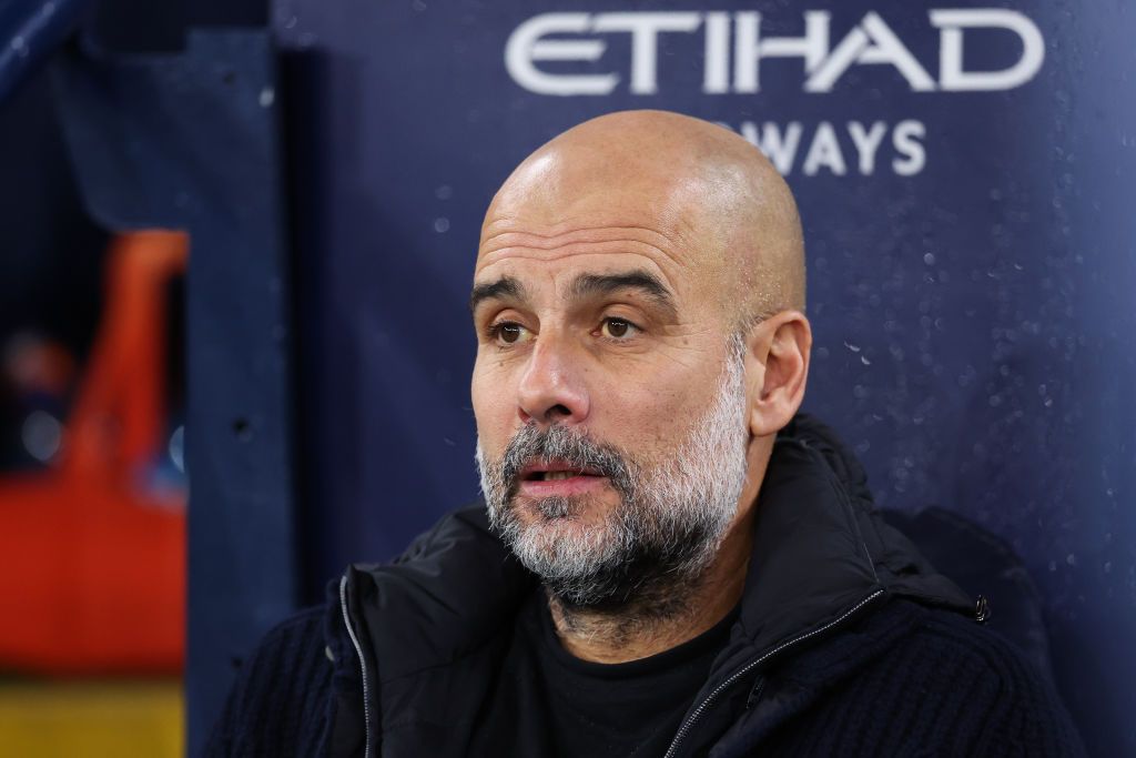 MANCHESTER, ENGLAND - DECEMBER 15: Josep &#039;Pep&#039; Guardiola, manager of Manchester City, looks on during the Premier League match between Manchester City FC and Manchester United FC at Etihad Stadium on December 15, 2024 in Manchester, England. (Photo by Alex Livesey - Danehouse/Getty Images)