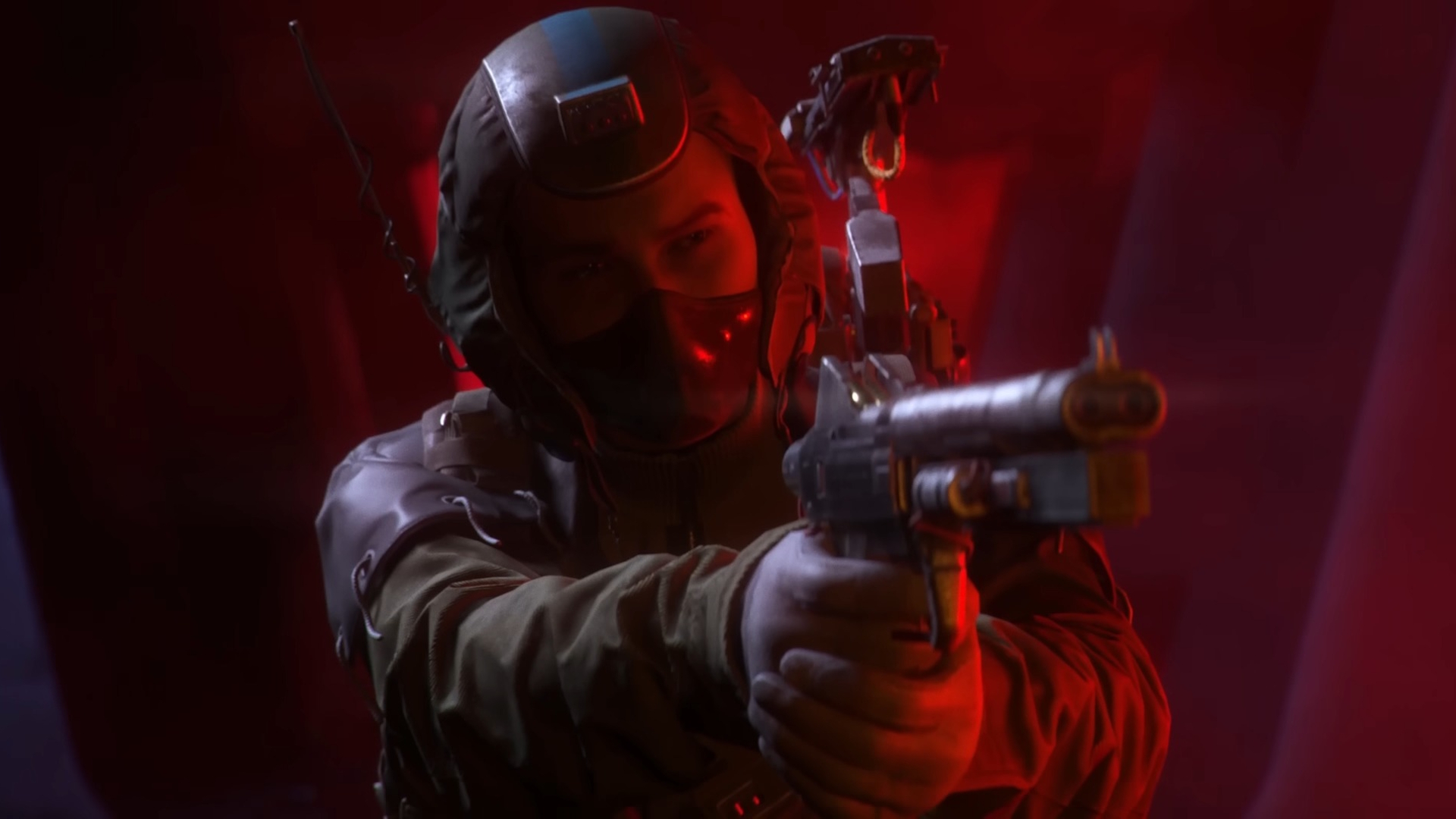 Arc Raiders player holding a gun in red light