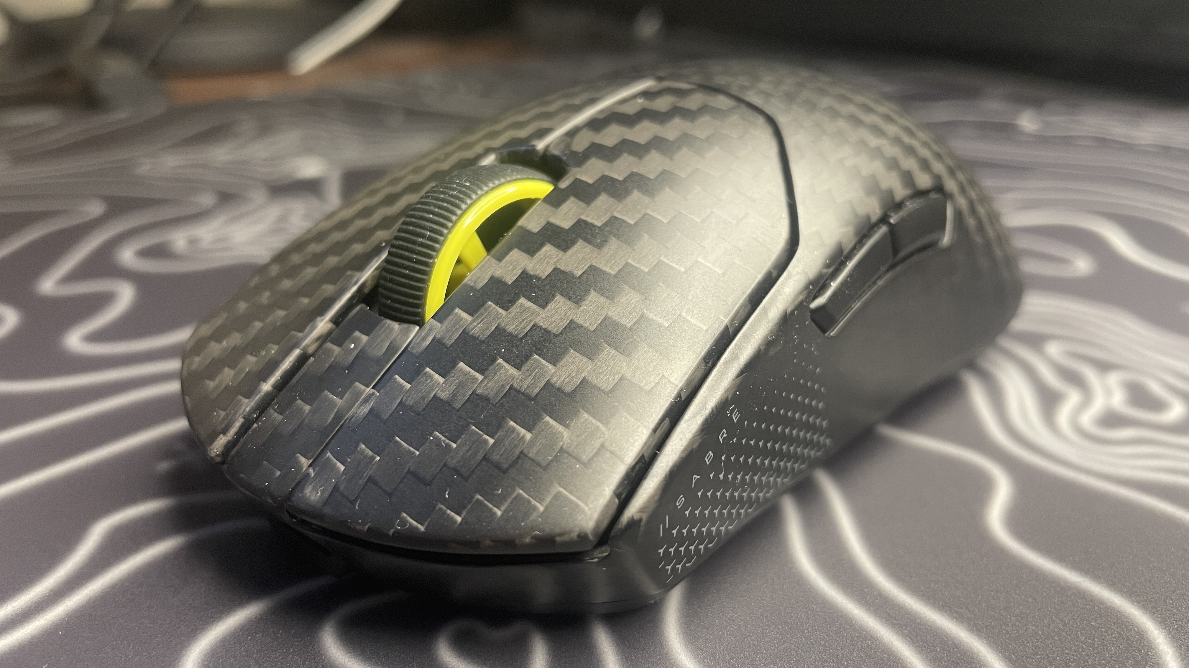 A Corsair Sabre V2 Pro Wireless CF gaming mouse.