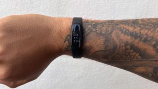 Lloyd Coombes wearing the Fitbit Luxe fitness tracker