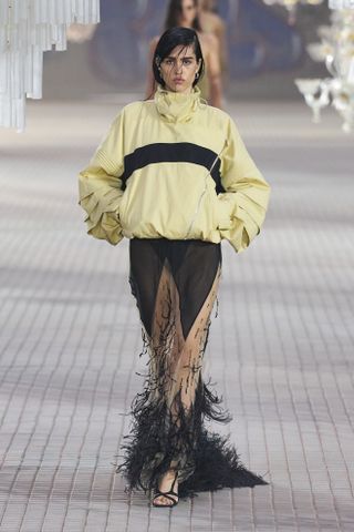 A model walks the runway during Milan Fashion Week spring/summer 2025.