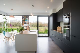 kitchen extension to barn conversion with black units