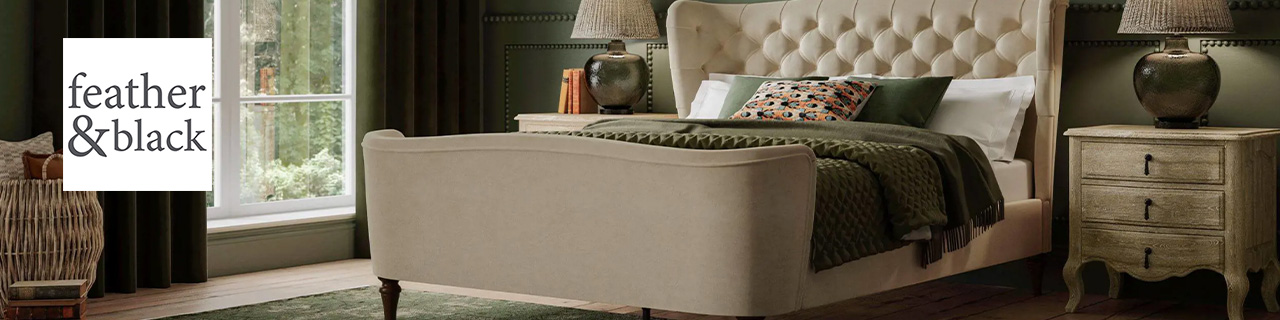 feather and black logo top left with a wide image of a green tone bedroom