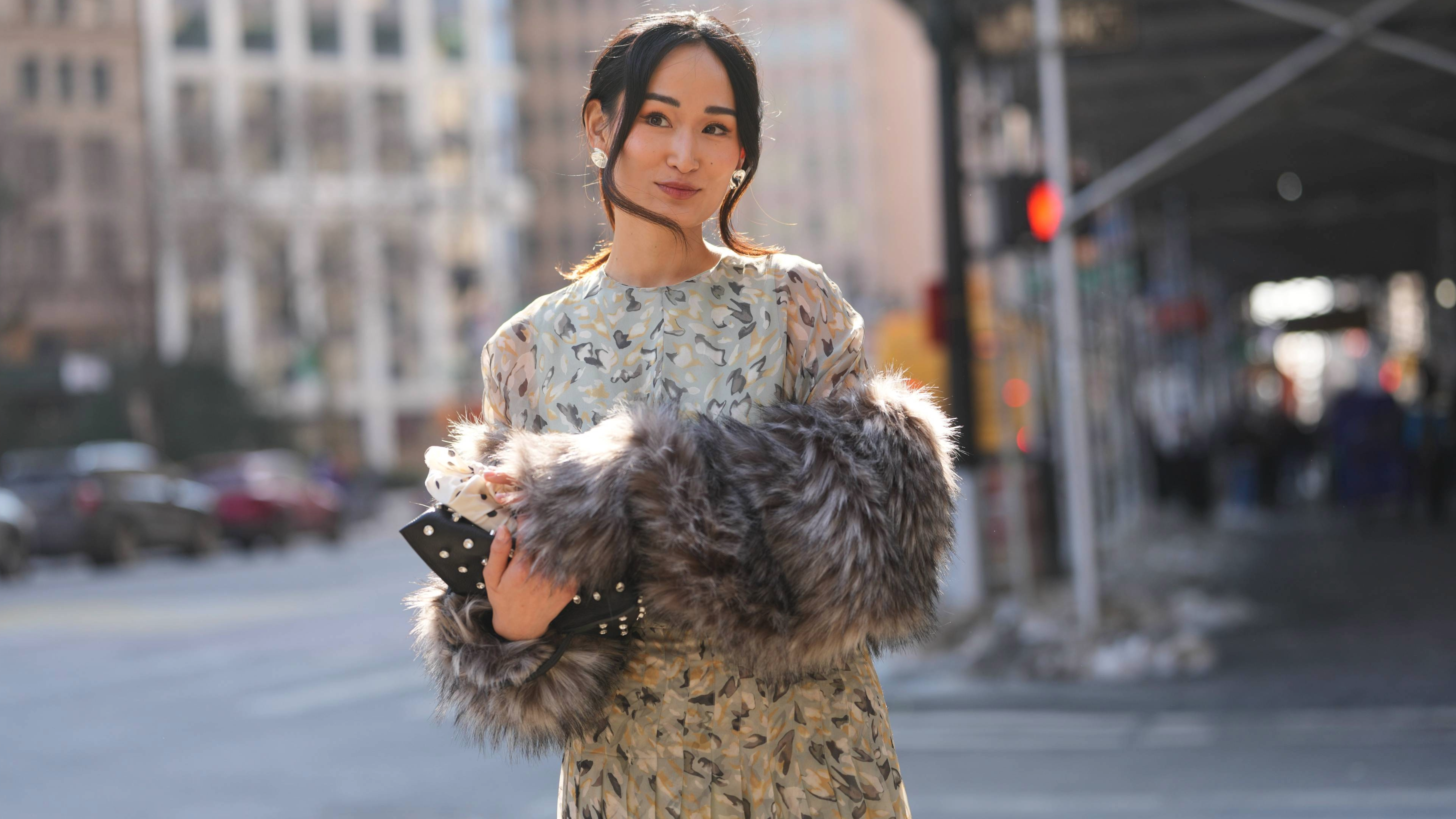 woman wearing a floral dress.