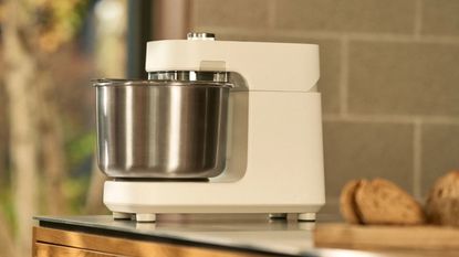 Ooni Halo Pro Spiral Mixer in polar white on a kitchen island
