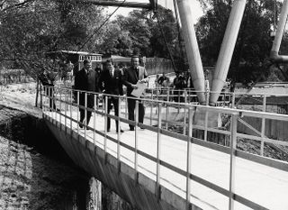 From left, Frank Newby, Lord Snowdon and Price at the opening of the New Aviary at London Zoo, 1965