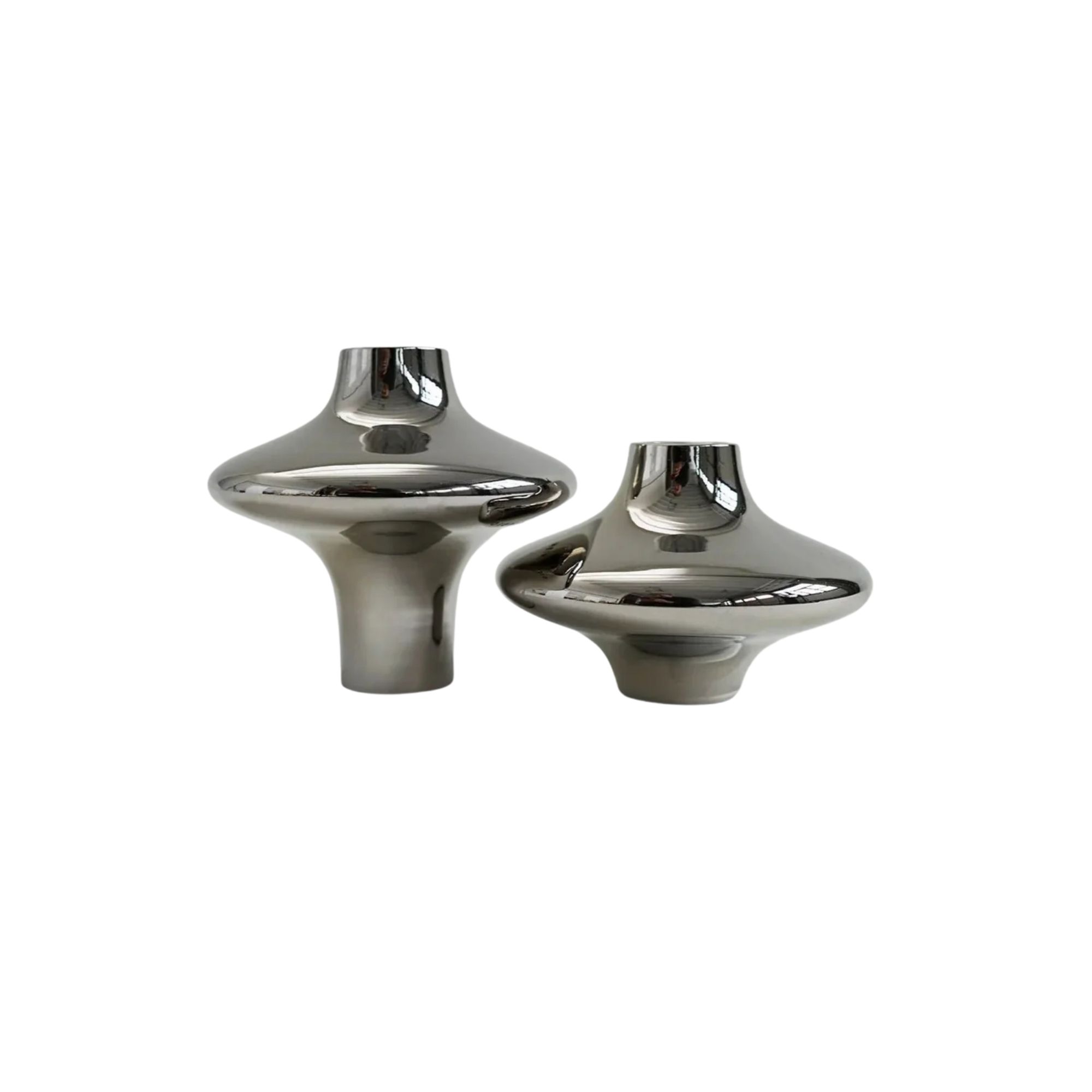 two silver candle holders