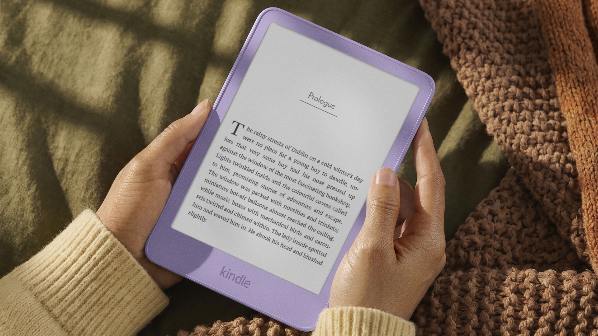 Amazon Kindle being held on a cover