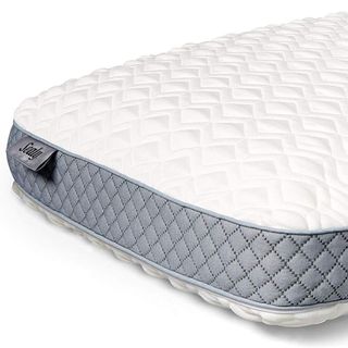 A corner of the Sealy Molded Bed Pillow against a white background.