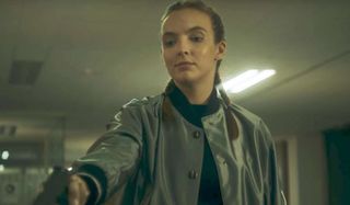 Killing Eve Jodie Comer looks ready to shoot someone off camera