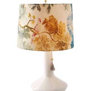 white lamp base with traditional bird patterned fabric shade