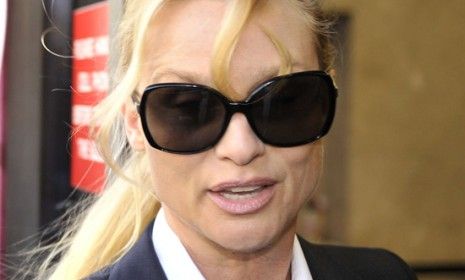 Nicollette Sheridan arrives in court where she is suing &amp;quot;Desperate Housewives&amp;quot; creator Marc Cherry for wrongful termination.