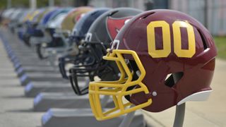 NFL helmets with logos