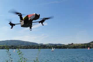 Parrot AR Drone in outdoor hull by a lake