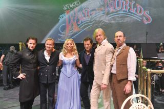 Justin Hayward with the cast of the musical The War Of The Worlds. From left: Rhydian Roberts, Jason Donovan, Liz McClarnon, Jeff Wayne, Hayward and Chris Thompson