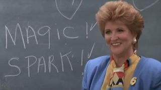 Fannie Flagg standing in front of a chalkboard in Fried Green Tomatoes