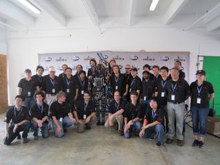 Team Wrecs Poses with Robot