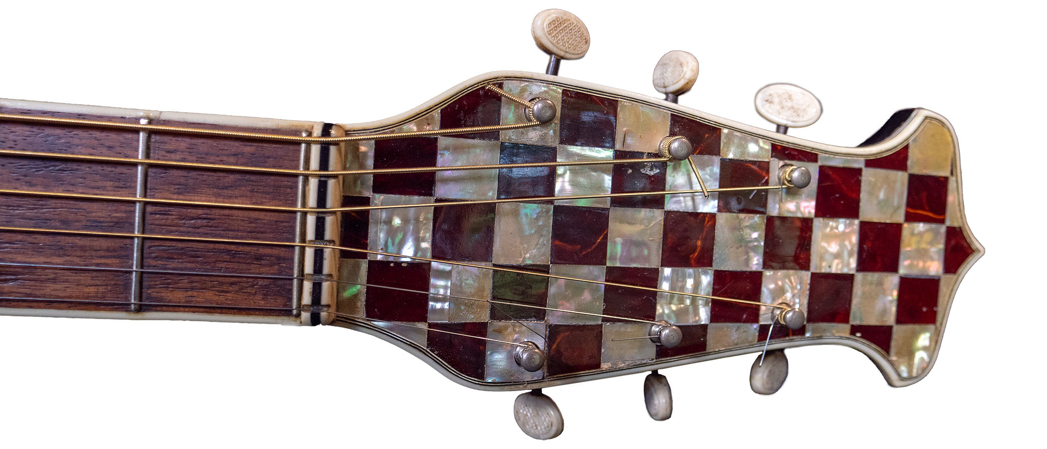 German archtops had some eye-popping decorative flourishes such as this checkerboard headstock