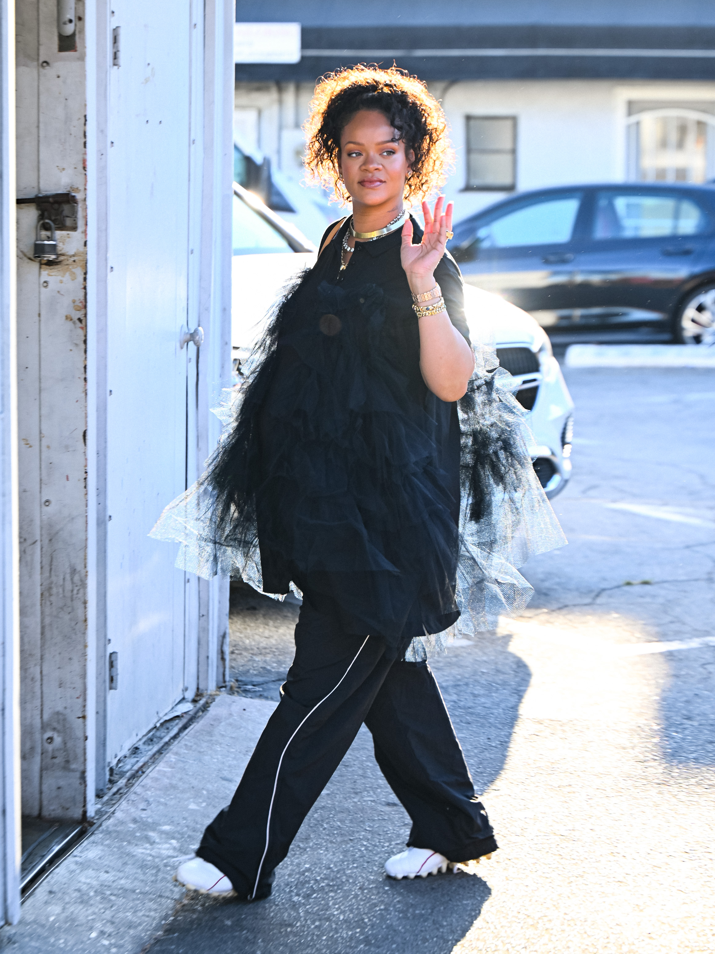 A pregnant Rihanna wore track pants with cleated sneakers