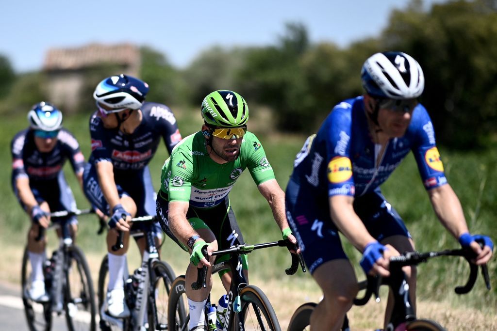 Team Deceuninck Quicksteps Mark Cavendish of Great Britain wearing the best sprinters green jersey rides during the 13th stage of the 108th edition of the Tour de France cycling race 219 km between Nimes and Carcassonne on July 09 2021 Photo by AnneChristine POUJOULAT AFP Photo by ANNECHRISTINE POUJOULATAFP via Getty Images