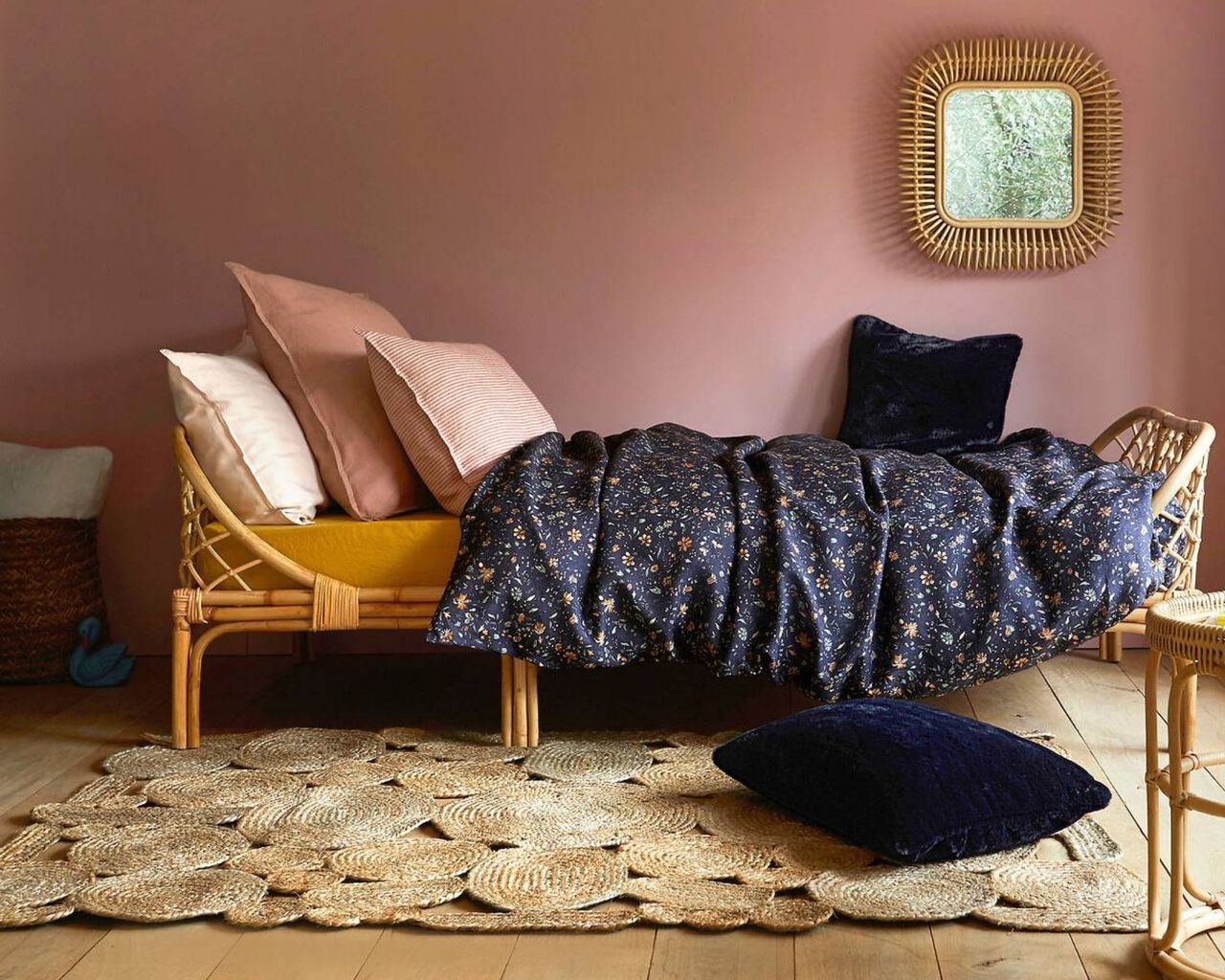 La Redoute Katsuki Child's Rattan Bed with Base in pink bedroom with bamboo furniture and jute rug
