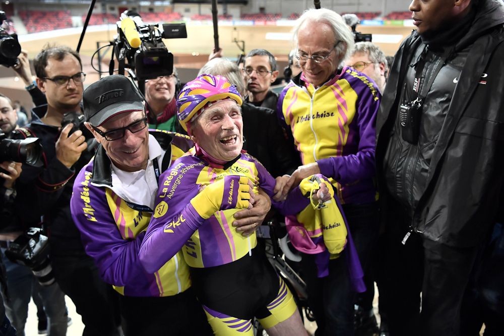 French centenarian cyclist Robert Marchand reacts after setting a one-hour track cycling World record at 22.547km in the over-105 age group