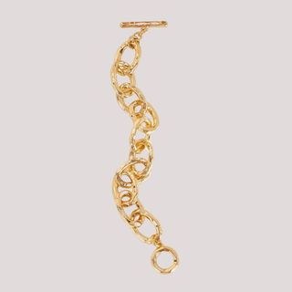 flat lay image of gold bracelet