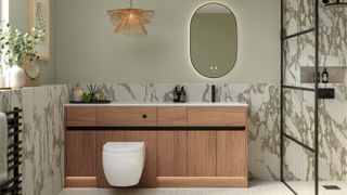 bathroom with wooden vanity, green tiles, painted wall and walk in shower 