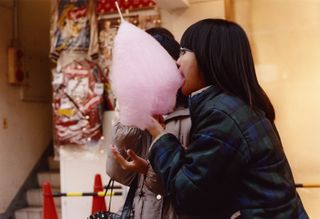 Japanese girls eating cotton candy, from SIGNS, by Lucie Rox