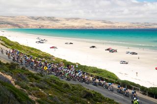 WILLUNGA HILL AUSTRALIA JANUARY 29 A general view of the peloton passing through a Seaside landscape during the 2nd Santos Festival Of Cycling 2022 Mens Elite Stage 3 a 1132km stage from McLaren Vale to Willunga Hill 224m TourDownUnder on January 29 2022 in Willunga Hill Australia Photo by Daniel KaliszGetty Images